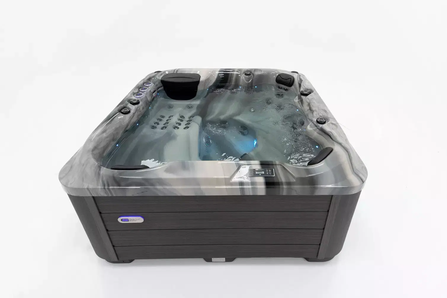 Rectangular grey hot tub with marbled cover and built-in seating, blue LED lights in the water, and a digital control panel on the edge.